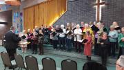 Tom starting to conduct the choir